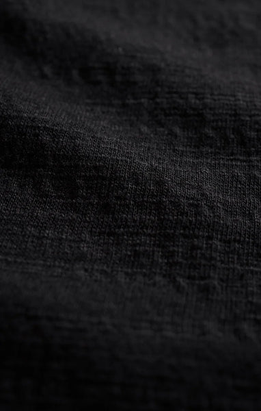 TEXTURED FLARED JUMPSUIT