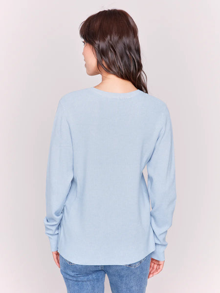 V-NECK SWEATER WITH GROMMET DETAIL