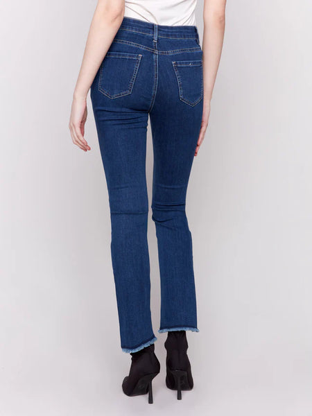 BOOTCUT JEAN WITH ASYMETRICAL HEM