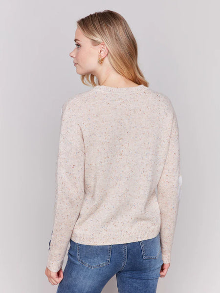 SWEATER WITH FLOWER DETAIL